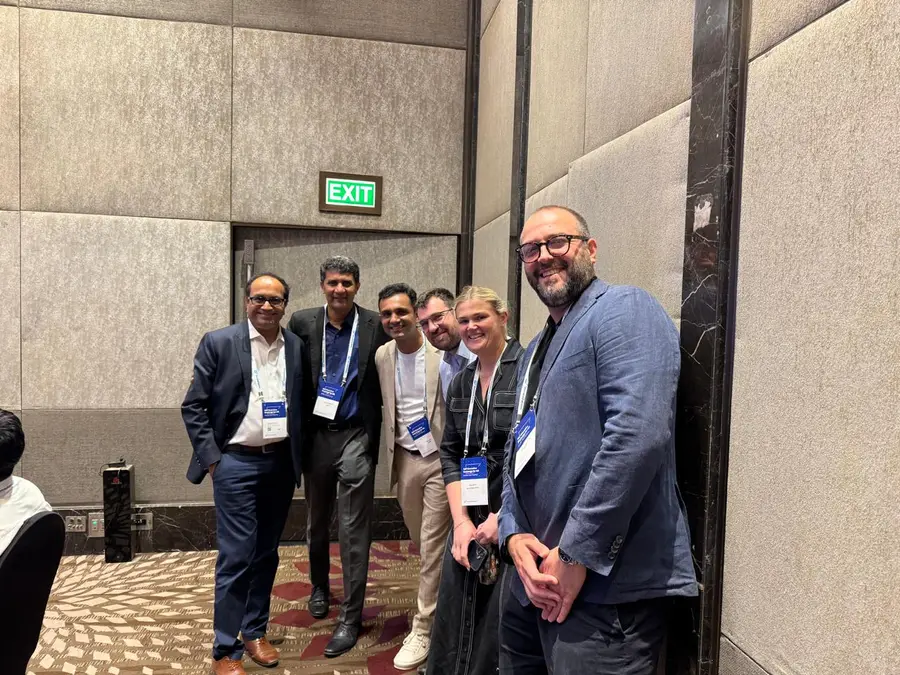 VISCAP, SAP and SmartRecruiters colleagues talking between sessions.
