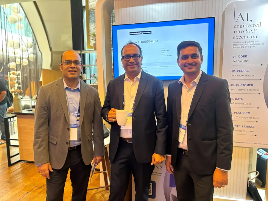 Three VISCAP colleagues at the VISCAP stand.